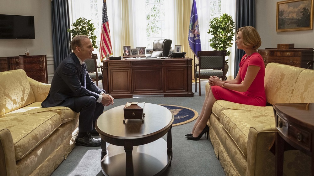 President Chambers (Bob Odenkirk) and Charlotte (Charlize Theron) in LONG SHOT.
